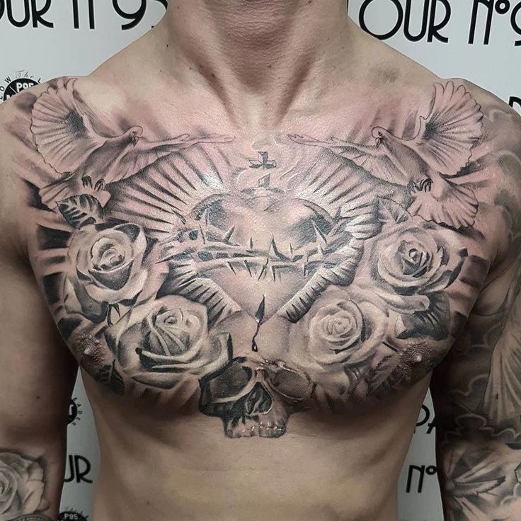 47 Cool Religious Chest Tattoo Pictures